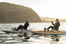 Load image into Gallery viewer, A man and a woman pedal around the bay on Hobie Mirage Lynx Kayaks
sku:27100035-23