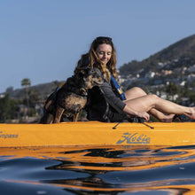 A woman and her dog enjoy the Hobie Compass Kayak out on the water | SKU: 81712230-22