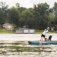 An angler reeling in a fish on a Hobie Pro Angler 14 360 | SKU: 86221011-23