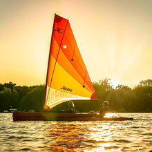 Hobie Kayak Tandem Island on calm water at sunset | SKU: 8892049-23